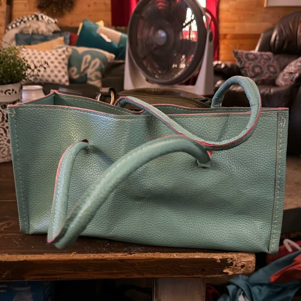 Turquoise satchel purse - unable to find brand name